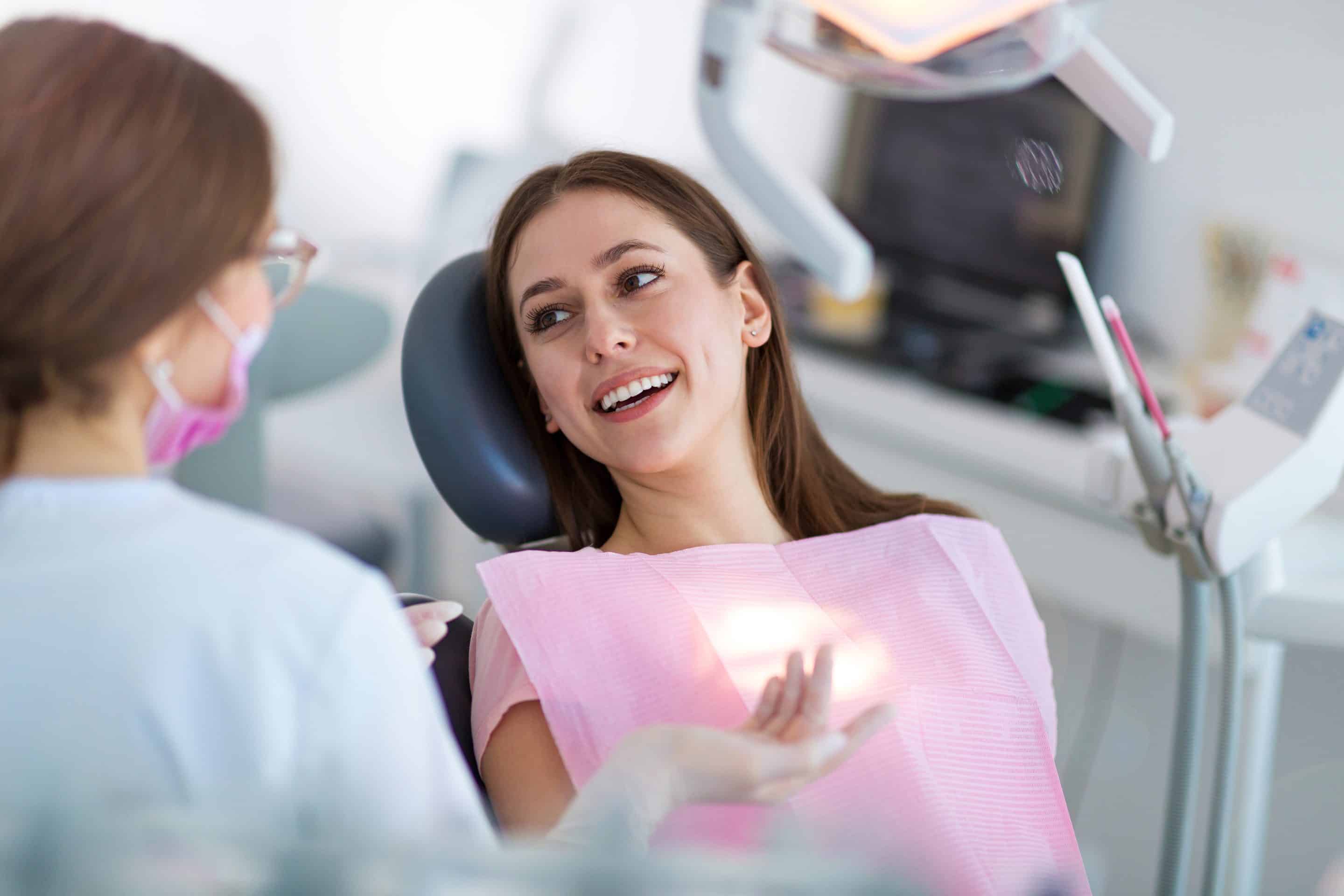 dental patient talking with dr turner during deep dental cleaning appointment at the dentistry on monroe in charlotte